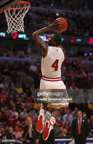 Victor Oladipo of the Indiana Hoosiers dunks against the Illinois Fighting Illini during a quarterfinal game of the Big Ten Basketball Tournament at...