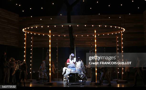 Actors perform in "Carousel", a musical comedy, on March 15, 2013 at the Chatelet theatre in Paris. The music of Carousel is by Richard Rodgers, and...