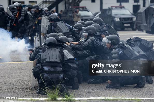 Brazilian paramilitary police CHOQUE batallion personnel in riot gear ...