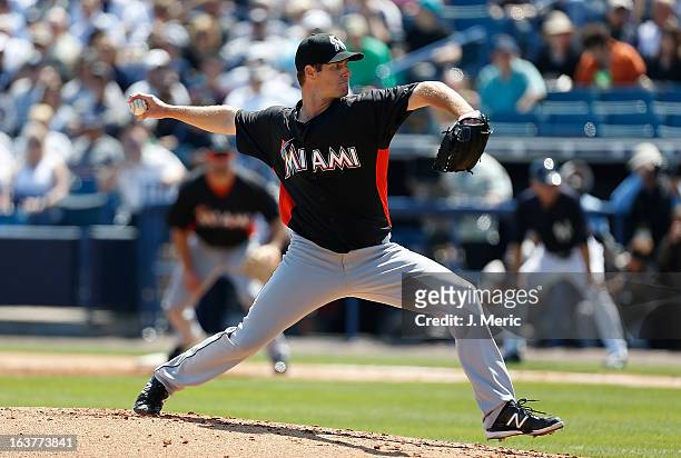 Pitcher John Maine of the Miami Marlins pitches against the New York Yankees during a Grapefruit League Spring Training Game at George M....