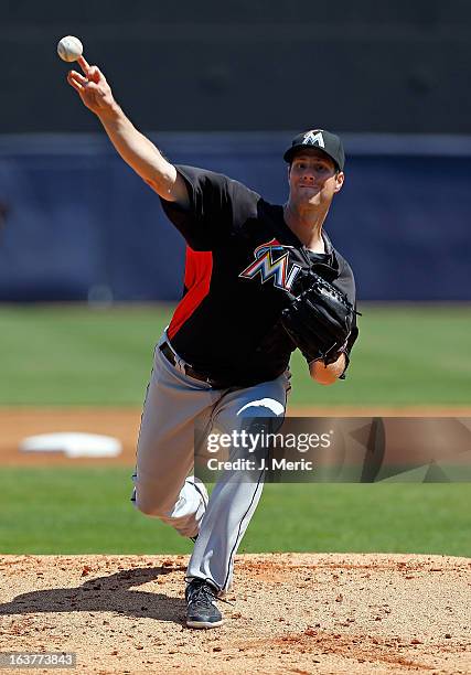 Pitcher John Maine of the Miami Marlins pitches against the New York Yankees during a Grapefruit League Spring Training Game at George M....