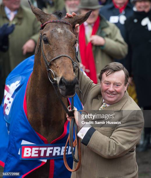 Bobs Worth and trainer Nicky Henderson celebrate winning the Gold Cup on day 4 of the Cheltenham Festival on Gold Cup Day at Cheltenham racecourse on...