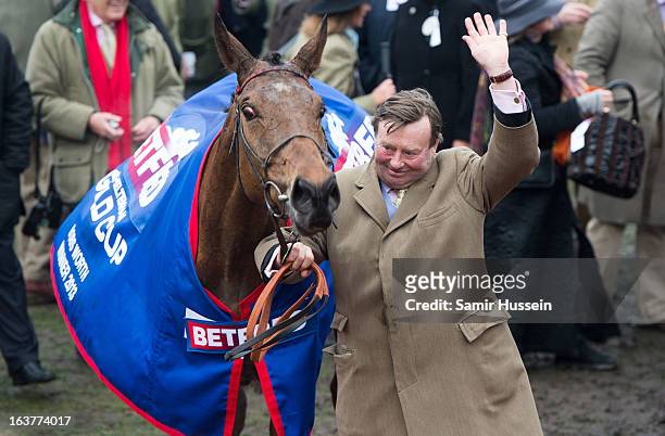 Bobs Worth and trainer Nicky Henderson celebrate winning the Gold Cup on day 4 of the Cheltenham Festival on Gold Cup Day at Cheltenham racecourse on...