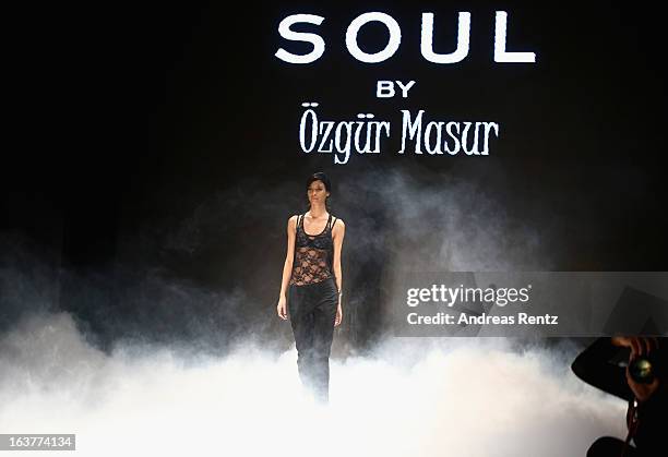 Model on the runway at rehearsals ahead of the Soul By Ozgur Masur show during Mercedes-Benz Fashion Week Istanbul Fall/Winter 2013/14 at Antrepo 3...