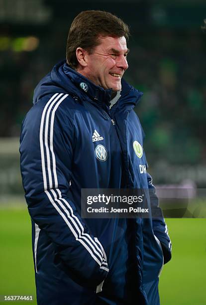 Head coach Dieter Hecking of Wolfsburg smiles prior to the Bundesliga match between VfL Wolfsburg and Fortuna Duesseldorf 1895 at Volkswagen Arena on...