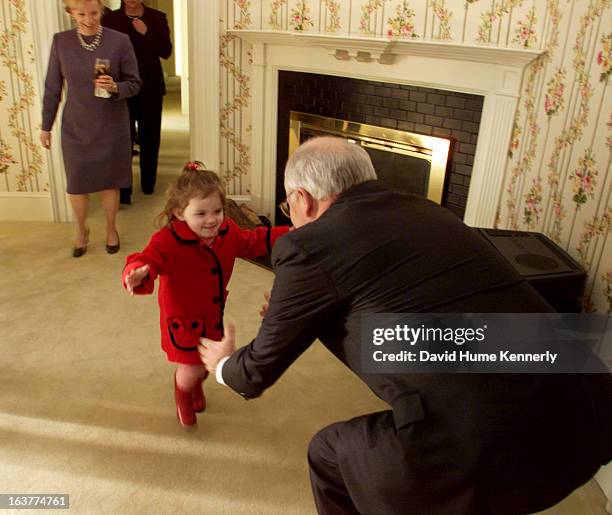 Vice President Dick Cheney photographed from 1975 to 2006 in Washington, DC. Pictured: Vice President Dick Cheney reaches out to granddaughter...
