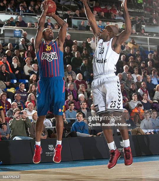 Pete Mickeal, #33 of FC Barcelona Regal competes with Patrick Christopher, #23 of Besiktas JK Istanbul during the 2012-2013 Turkish Airlines...