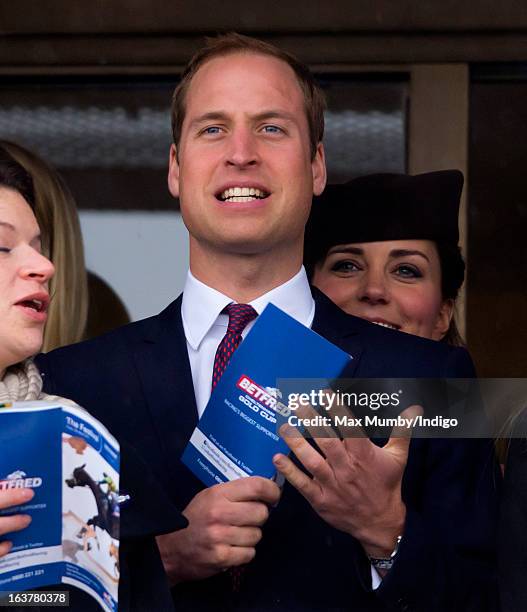 Prince William, Duke of Cambridge and Catherine, Duchess of Cambridge watch the racing as they attend Day 4 of The Cheltenham Festival at Cheltenham...