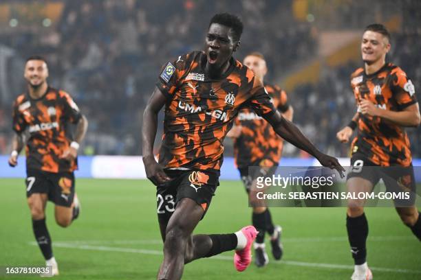 Marseille's Senegalese forward Ismaila Sarr celebrates scoring the opening goal during the French L1 football match between FC Nantes and Marseille...