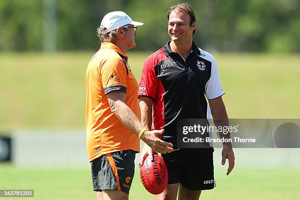 Saints assistant coach, Aaron Hamill and Giants coach, Kevin Sheedy speak prior to the AFL practice match between the Greater Western Sydney Giants...