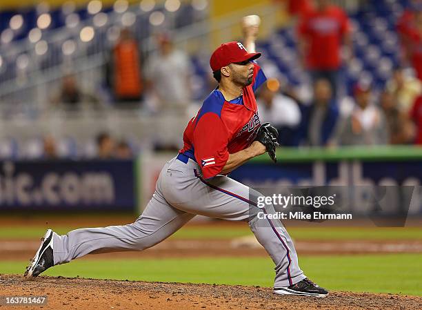 Romero of Puerto Rico pitches during a World Baseball Classic second round game against the United States at Marlins Park on March 15, 2013 in Miami,...