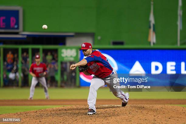 Romero of Team Puerto Rico pitches during Pool 2, Game 4 against Team USA in the second round of the 2013 World Baseball Classic on Friday, March 15,...