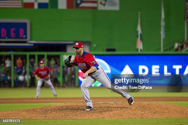 Romero of Team Puerto Rico pitches during Pool 2, Game 4 against Team USA in the second round of the 2013 World Baseball Classic on Friday, March 15,...