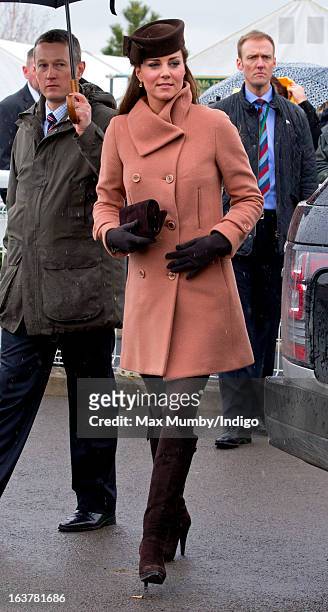 Catherine, Duchess of Cambridge attends Day 4 of The Cheltenham Festival at Cheltenham Racecourse on March 15, 2013 in London, England.