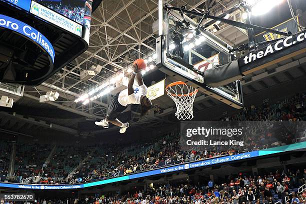 Member of the Air Elite Dunkers performs during halftime of a game between the Virginia Tech Hokies and the North Carolina State Wolfpack during the...