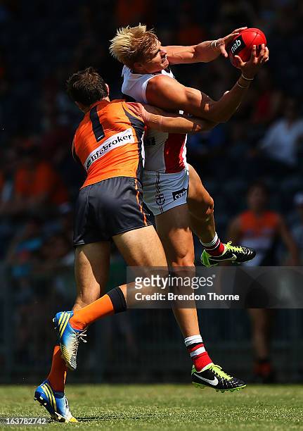 Nick Riewoldt of the Saints competes with Phil Davis of the Giants during the AFL practice match between the Greater Western Sydney Giants and the St...