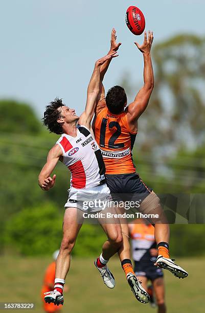 Jonathon Patton of the Giants competes with Farren Ray of the Saints during the AFL practice match between the Greater Western Sydney Giants and the...