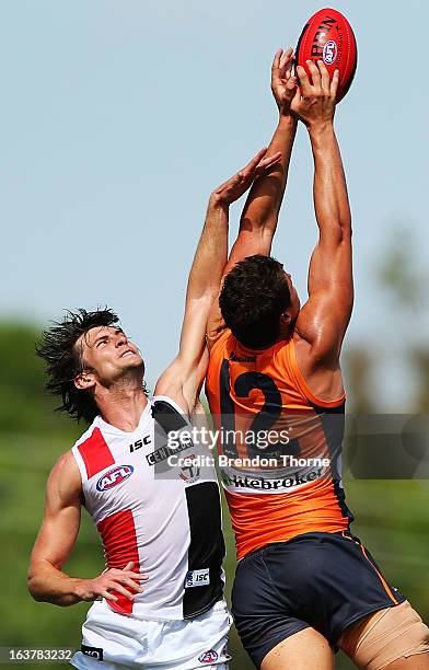 Jonathon Patton of the Giants competes with Farren Ray of the Saints during the AFL practice match between the Greater Western Sydney Giants and the...