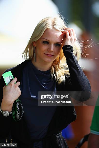 Swimmer Emilia Pikkarainen, girlfriend of Williams GP driver Valtteri Bottas, arrives in the paddock before qualifying for the Australian Formula One...