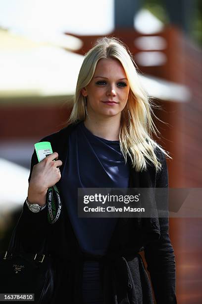 Swimmer Emilia Pikkarainen, girlfriend of Williams GP driver Valtteri Bottas, arrives in the paddock before qualifying for the Australian Formula One...