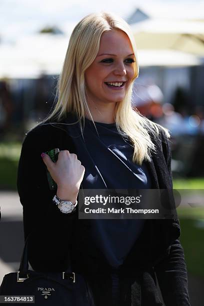 Swimmer Emilia Pikkarainen, girlfriend of Williams GP driver Valtteri Bottas, arrives in the paddock before qualifying for the Australian Formula One...