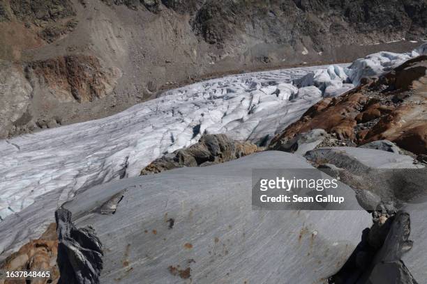The melting Gepatschferner glacier lies behind rocks it ground smooth it and once covered on August 22, 2023 above Kaunertal, Austria. Martin...