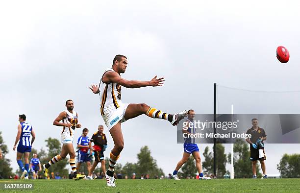 Lance Franklin of the Hawks kicks the ball during the AFL NAB Cup match between the North Melbourne Kangaroos and the Hawthorn Hawks at Highgate...