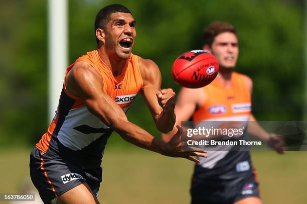 Curtly Hampton of the Giants hand balls during the AFL practice match between the Greater Western Sydney Giants and the St Kilda Saints at Blacktown...