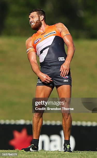 Sam Reid of the Giants checks the balls flight during the AFL practice match between the Greater Western Sydney Giants and the St Kilda Saints at...