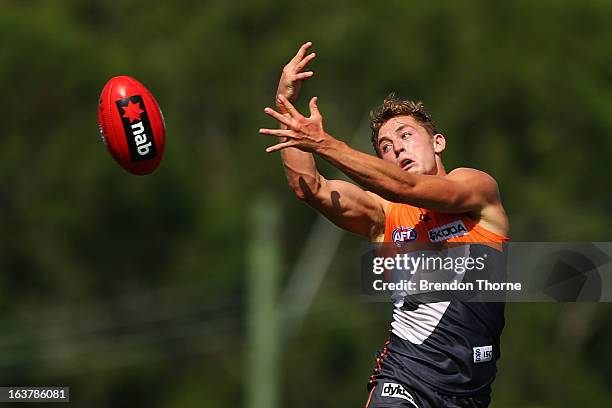 Devon Smith of the Giants contests a high ball during the AFL practice match between the Greater Western Sydney Giants and the St Kilda Saints at...