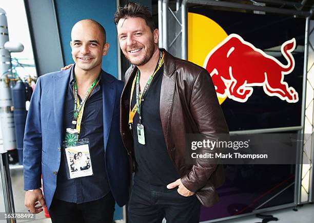 Adriano Zumbo and Manu Feildel visit the Infinti Red Bull Racing garage before qualifying for the Australian Formula One Grand Prix at the Albert...