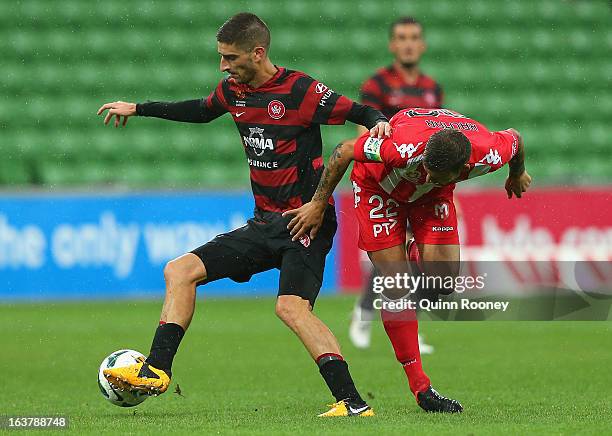 Iacopo La Rocca of the Wanderers and Nicholas Kalmar of the Heart contest for the ball during the round 25 A-League match between the Melbourne Heart...