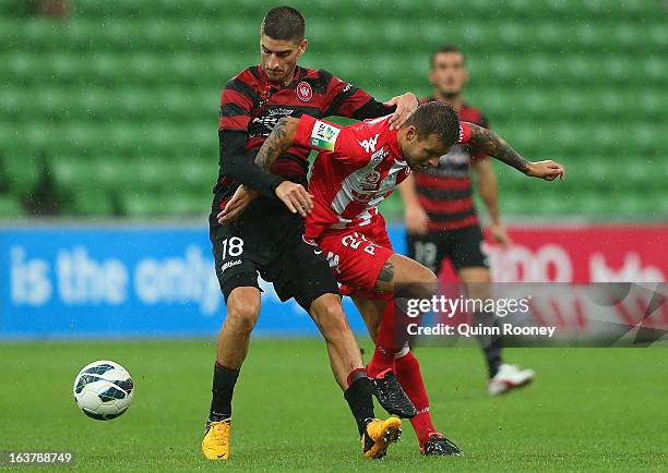 Iacopo La Rocca of the Wanderers and Nicholas Kalmar of the Heart contest for the ball during the round 25 A-League match between the Melbourne Heart...