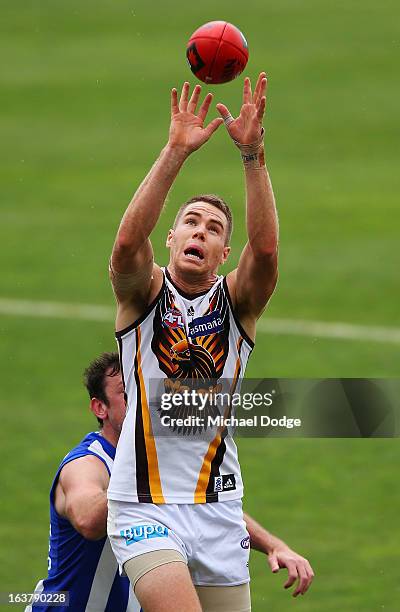 Max Bailey of the Hawks marks the ball during the AFL NAB Cup match between the North Melbourne Kangaroos and the Hawthorn Hawks at Highgate...