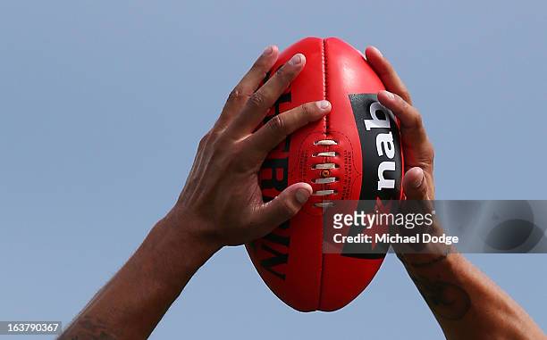 Lance Franklin marks the ball during the AFL NAB Cup match between the North Melbourne Kangaroos and the Hawthorn Hawks at Highgate Recreational...