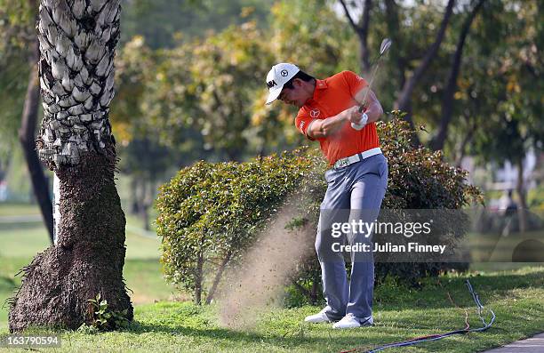 Liang Wenchong of China in action during day three of the Avantha Masters at Jaypee Greens Golf Club on March 16, 2013 in Delhi, India.