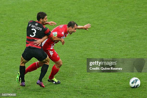 Adam D'Apuzzo of the Wanderers and Richard Garcia of the Heart contest for the ball during the round 25 A-League match between the Melbourne Heart...