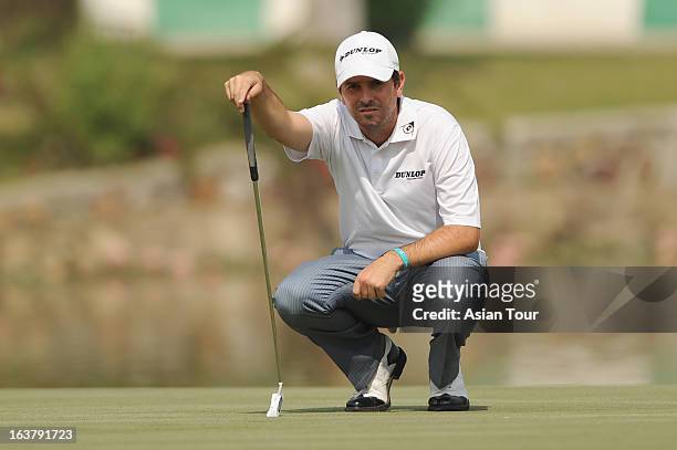 Thomas Aiken of South Africa in action during day 3 of the Avantha Masters at Jaypee Greens Golf Course on March 16, 2013 in Noida, India.