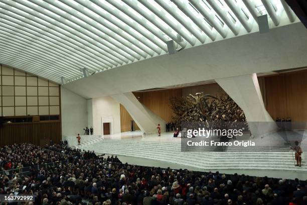 Newly elected Pope Francis attends his first audience with journalists and media inside the Paul VI hall on March 16, 2013 in Vatican City, Vatican....