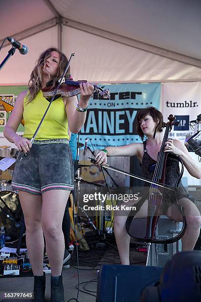 Violinist Rebecca Zeller and cellist Emily Brausa of Ra Ra Riot perform onstage during FILTER on Rainey St. At Clive Bar as part of the 2013 SXSW...