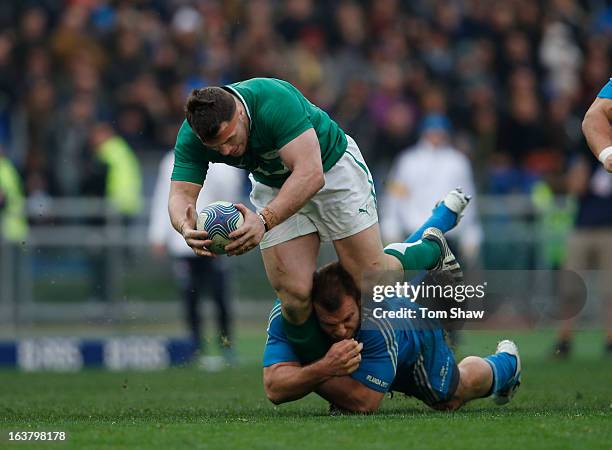 Cian Healy of Ireland is tackled during the RBS Six Nations match between Italy and Ireland at Stadio Olimpico on March 16, 2013 in Rome, Italy.