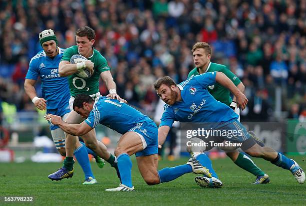 Craig Gilroy of Ireland is tackled during the RBX Six Nations match between Italy and Ireland at Stadio Olimpico on March 16, 2013 in Rome, Italy.