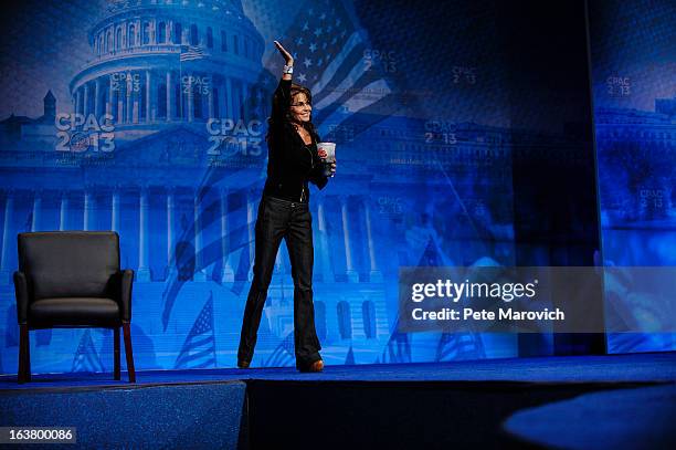 Sarah Palin, former Governor of Alaska, holds up a large soda as she speaks about New York City Mayor Michael Bloomberg's proposed large soda ban, at...