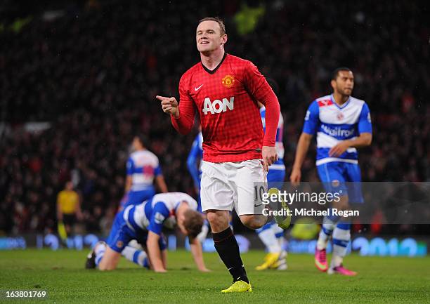 Wayne Rooney of Manchester United celebrates scoring the opening goal during the Barclays Premier League match between Manchester United and Reading...