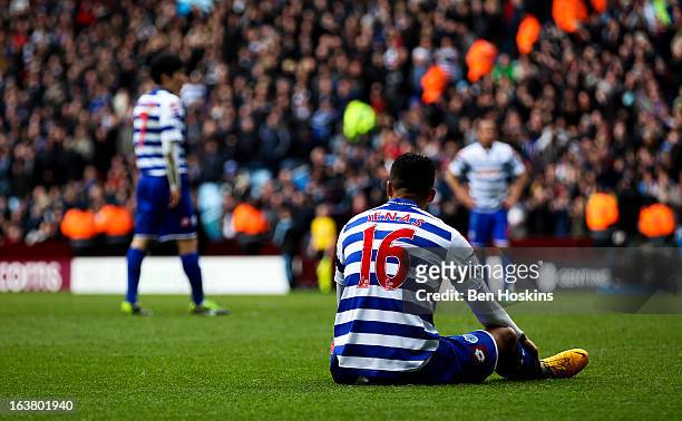 Jermaine Jenas of QPR sits dejected after QPR concede their third goal of the game during the Barclays Premier League match between Aston Villa and...