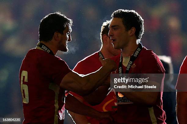 Wales teammates Sam Warburton and George North celebrate winning the Six Nations Championship during the RBS Six Nations match between Wales and...