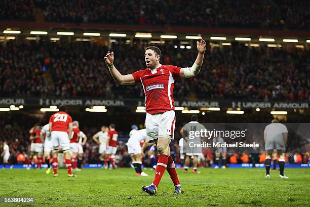 Alex Cuthbert of Wales celebrates winning the Championship after the RBS Six Nations match between Wales and England at Millennium Stadium on March...