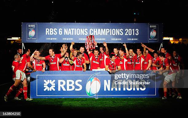 The Wales team celebrate winning the Championship after the RBS Six Nations match between Wales and England at Millennium Stadium on March 16, 2013...