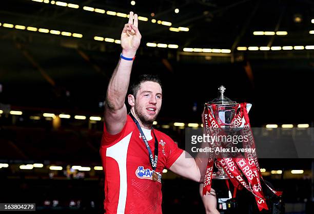 Scorer of both of his team's tries Alex Cuthbert of Wales celebrates with the Six Nations Trophy during the RBS Six Nations match between Wales and...