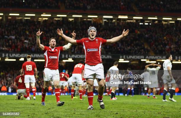 Jonathan Davies and Alex Cuthbert of Wales celebrate winning the Championship after the RBS Six Nations match between Wales and England at Millennium...